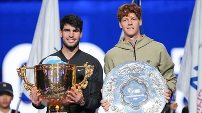 Carlos Alcaraz, left, of Spain poses with his trophy after winning against Jannik Sinner, right, of Italy during their men's singles finals match of the China Open. (AP) Carlos Alcaraz, left, of Spain poses with his trophy after winning against Jannik Sinner, right, of Italy during their men's singles finals match of the China Open. (AP)