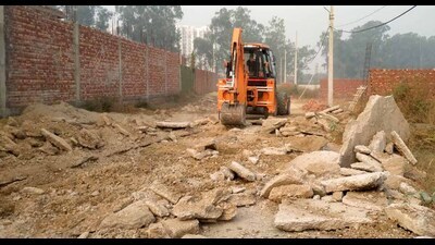 GLADA officials demolished illegal colonies in Jaspal Bangar in Ludhiana on Monday. (Hindustan Times)