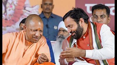 Haryana chief minister Nayab Singh Saini and Uttar Pradesh CM Yogi Adityanath during an event at Pehowa in Kurukshetra. (PTI)