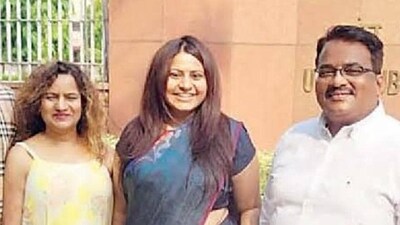 Dilip Khedkar with daughter Puja Khedkar and ex-wife Manorama. (HT) Dilip Khedkar with daughter Puja Khedkar and ex-wife Manorama. (HT)