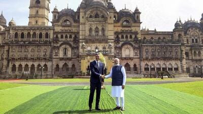 Prime Minister Narendra Modi, right, shakes hand with his Spanish counterpart Pedro Sanchez in front of Laxmi Vilas Palace before their meeting in Vadodara. (AP /Gujarat State Press Information Bureau)