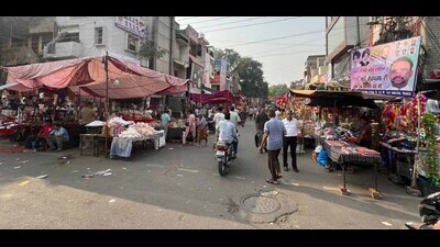 Shops spill out onto the roads as stalls laden with festive goodies line market lanes, obstructing traffic, ahead of Diwali at Jawahar Nagar Camp in Ludhiana on Monday. (Manish/Hindustan Times) Shops spill out onto the roads as stalls laden with festive goodies line market lanes, obstructing traffic, ahead of Diwali at Jawahar Nagar Camp in Ludhiana on Monday. (Manish/Hindustan Times)
