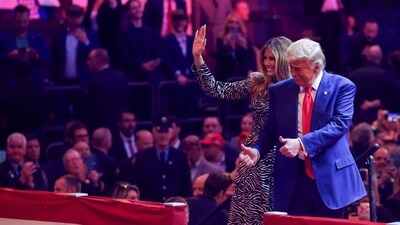 Republican presidential nominee and former U.S. President Donald Trump and Melania Trump gesture on stage during a campaign rally at Madison Square Garden, in New York, U.S., October 27, 2024. REUTERS/Brendan McDermid (REUTERS)
