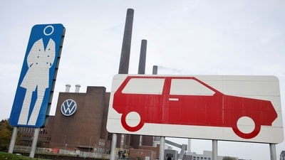 File photo: A woman walks past a factory at Volkswagen AG headquarters, in Wolfsburg, Germany. (REUTERS)