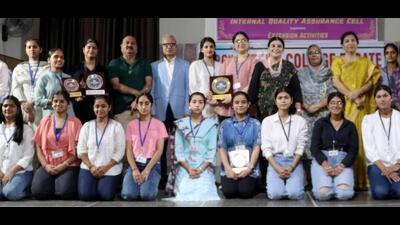 Winners of the inter-college debate pose with their certificates in Ludhiana on Monday. (HT Photo)