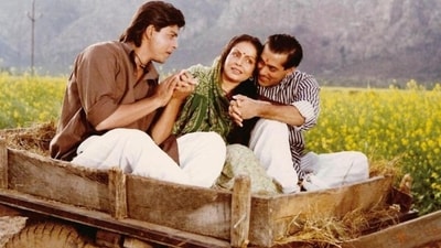 Shah Rukh Khan, Rakhee and Salman Khan in a still from Karan Arjun.
