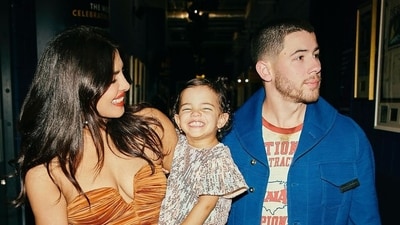 Malti Marie Chopra Jonas with parents Priyanka Chopra and Nick Jonas in London. Malti Marie Chopra Jonas with parents Priyanka Chopra and Nick Jonas in London.