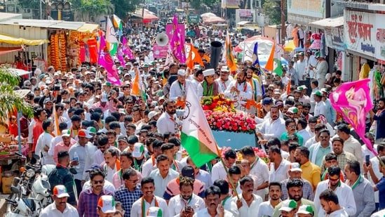 Maharashtra deputy chief minister and Nationalist Congress Party (NCP) chief, Ajit Pawar, during a roadshow. (ANI)