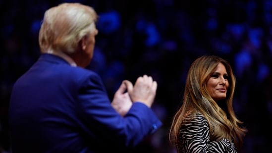 Republican presidential nominee former President Donald Trump, left, claps for former first lady Melania Trump on stage during a campaign rally at Madison Square Garden, Sunday, Oct. 27, 2024, in New York. (AP Photo/Julia Demaree Nikhinson) (AP)