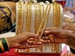 Hindu devotees buy gold and silver items of Dhanteras.
