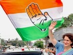 Congress General Secretary and candidate for Wayanad by-elections, Priyanka Gandhi Vadra waves to the crowd while on her to address a meeting.