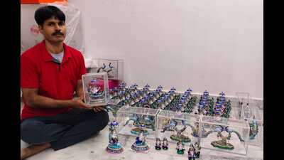 A local craftsman with his artifacts (HT)