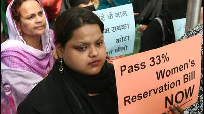 Demonstrators hold placards for the passing of the Women's Reservation Bill in Parliament. (HT File Photo) Demonstrators hold placards for the passing of the Women's Reservation Bill in Parliament. (HT File Photo)