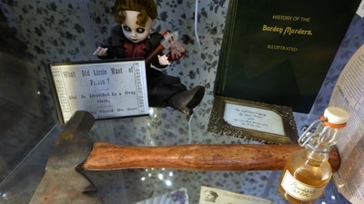 An axe, front, is displayed near a figurine, left, in a display case, Wednesday, Oct. 16, 2024, at the Lizzie Borden House, site of an 1892 double axe murder, in Fall River, Mass. Halloween 2024 travel special: Lizzie Borden's spooky house, haunted Shanghai Tunnels—Top ghost tours to give you chills (AP Photo/Steven Senne) An axe, front, is displayed near a figurine, left, in a display case, Wednesday, Oct. 16, 2024, at the Lizzie Borden House, site of an 1892 double axe murder, in Fall River, Mass. Halloween 2024 travel special: Lizzie Borden's spooky house, haunted Shanghai Tunnels—Top ghost tours to give you chills (AP Photo/Steven Senne)