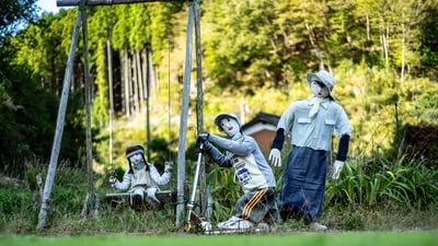 Silence pervades the air in Ichinono, where residents have handcrafted stuffed mannequins to create a semblance of a bustling society. (AFP)