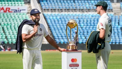 Indian captain Rohit Sharma interacts with his Australian counterpart Pat Cummins (PTI) Indian captain Rohit Sharma interacts with his Australian counterpart Pat Cummins (PTI)