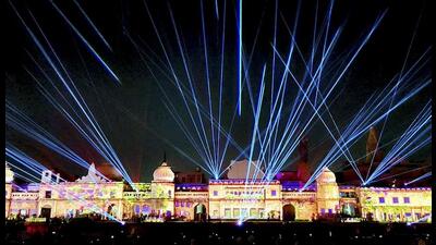 People witness a laser show ahead of Ayodhya Deepotsav celebrations, in Ayodhya, Tuesday. (PTI Photo) People witness a laser show ahead of Ayodhya Deepotsav celebrations, in Ayodhya, Tuesday. (PTI Photo)