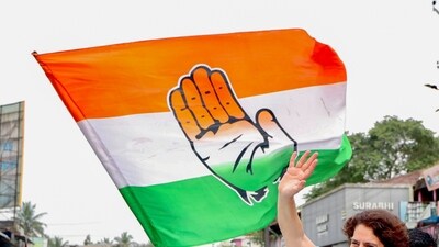 Congress General Secretary and candidate for Wayanad by-elections, Priyanka Gandhi Vadra waves to the crowd while on her to address a meeting. (AICC)