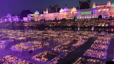 Ayodhya lights up with hundreds and lakhs of diyas to celebrate Diwali. (PTI) Ayodhya lights up with hundreds and lakhs of diyas to celebrate Diwali. (PTI)