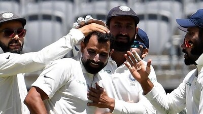 Mohammed Shami (C) celebrates with team-mates after taking a wicket in Perth during India's tour of Australia in 2018. (AFP)