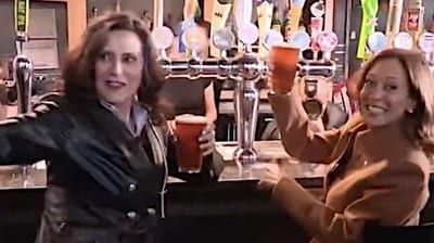 Kamala Harris and Michigan Governor Gretchen Whitmer enjoy beer at a bar. (C-SPAN)