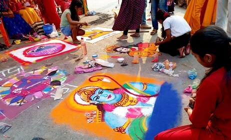 Children participate in a rangoli making competition. Opt for organic colours that are safe for children. (PTI) Children participate in a rangoli making competition. Opt for organic colours that are safe for children. (PTI)