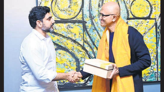 Andhra Pradesh minister for IT and electronics Nara Lokesh meets Microsoft CEO Satya Nadella at the Microsoft headquarters in Redmond, Washington, on Tuesday. (PTI)