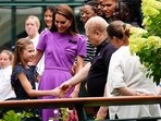 Britain's Catherine, Princess of Wales and Princess Charlotte meet ground staff day fourteen of the 2024 Wimbledon Championships at the All England Lawn Tennis and Croquet Club, London, Britain, ahead of Kate presenting the trophy to the winner of the men's final. 
