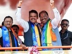 Maharashtra deputy chief minister Devendra Fadnavis with state party chief and candidate from Kamthi Assembly constituency, Chandrashekhar Bawankule during his nomination rally for the Maharashtra Assembly elections, in Nagpur on Tuesday. (ANI)