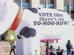 Student activists encourage others to take advantage of early voting and cast their ballots in the 2024 election at a the University of Wisconsin in Madison, Wisconsin