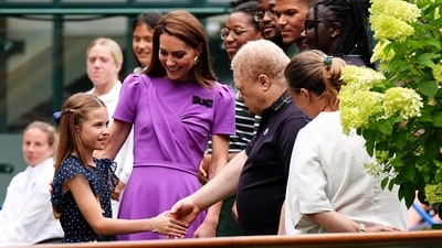 Britain's Catherine, Princess of Wales and Princess Charlotte meet ground staff day fourteen of the 2024 Wimbledon Championships at the All England Lawn Tennis and Croquet Club, London, Britain, ahead of Kate presenting the trophy to the winner of the men's final. (via REUTERS)