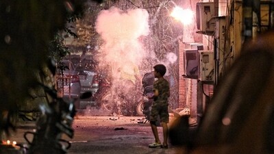 Children burst crackers on the eve of Diwali at Old Rajendra Nagar in New Delhi, on Wednesday. (Sanchit Khanna/HT photo) Children burst crackers on the eve of Diwali at Old Rajendra Nagar in New Delhi, on Wednesday. (Sanchit Khanna/HT photo)