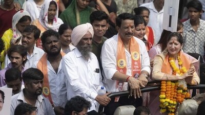 Former encounter specialist Pradeep Sharma's wife Swikriti Sharma filed her nomination as an independent after being denied a ticket by Shiv Sena. (Satish Bate/ Hindustan Times) Former encounter specialist Pradeep Sharma's wife Swikriti Sharma filed her nomination as an independent after being denied a ticket by Shiv Sena. (Satish Bate/ Hindustan Times)