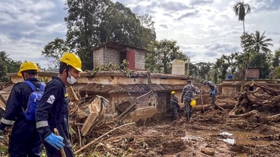 Indian Navy's disaster relief team conducts search and rescue operation at a landslide-hit area in Wayanad. (PTI) Indian Navy's disaster relief team conducts search and rescue operation at a landslide-hit area in Wayanad. (PTI)