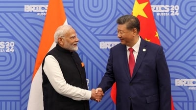 Indian Prime Minister Narendra Modi shakes hands with Chinese President Xi Jinping before their meeting on the sidelines of the Brics summit in Kazan, Russia, on October 23. (Reuters) Indian Prime Minister Narendra Modi shakes hands with Chinese President Xi Jinping before their meeting on the sidelines of the Brics summit in Kazan, Russia, on October 23. (Reuters)