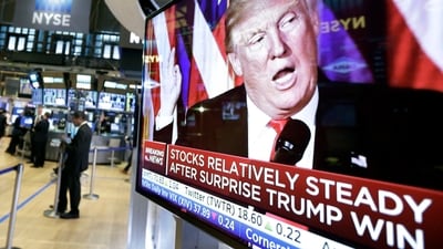 FILE - An image of President-elect Donald Trump appears on a television screen on the floor of the New York Stock Exchange, Nov. 9, 2016. (AP Photo/Richard Drew, File) (AP)