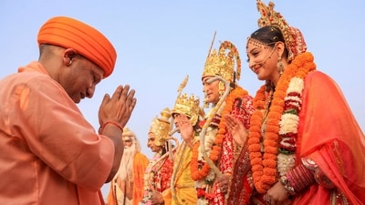 Ayodhya: Uttar Pradesh chief minister Yogi Adityanath greets artists dressed as Lord Rama, Lord Lakshmana and Goddess Sita. (PTI) Ayodhya: Uttar Pradesh chief minister Yogi Adityanath greets artists dressed as Lord Rama, Lord Lakshmana and Goddess Sita. (PTI)