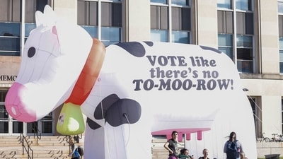 Student activists encourage others to take advantage of early voting and cast their ballots in the 2024 election at a the University of Wisconsin in Madison, Wisconsin (AFP)