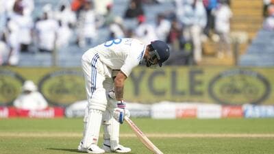 Virat Kohli reacts after being dismissed on Day 3 of second Test against New Zealand in Pune. (AP) Virat Kohli reacts after being dismissed on Day 3 of second Test against New Zealand in Pune. (AP)
