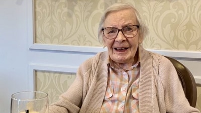 Kathleen Hennings is thriving at the age of 105 years, single and drinking her favourite beer. (Care UK/SWNS) Kathleen Hennings is thriving at the age of 105 years, single and drinking her favourite beer. (Care UK/SWNS)