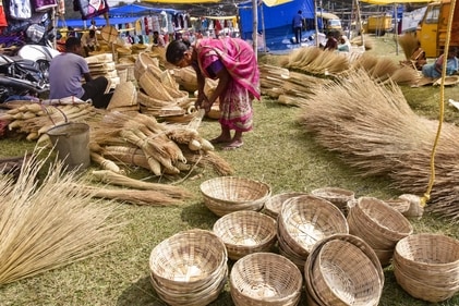 On Diwali, people buy brooms as it is believed that it will bring prosperity. (PTI) On Diwali, people buy brooms as it is believed that it will bring prosperity. (PTI)