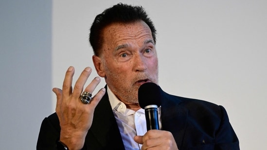 US-Austrian former politician, former professional bodybuilder and actor Arnold Schwarzenegger answers questions after having been awarded with an honorary doctorate at the Hertie School of Governance on September 17, 2024 in Berlin, Germany. Schwarzenegger receives the honorary doctorate "in recognition of his significant contributions to the field of governance, particularly through his work in sustainability and civic engagement". (Photo by John MACDOUGALL / AFP) (AFP)