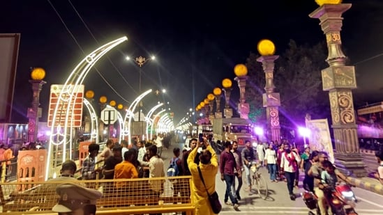 A street decorated ahead of Ayodhya Deepotsav celebrations, in Ayodhya. PM Modi said that several generations have waited for this Diwali, while many have "sacrificed their lives". "The current generation is extremely fortunate to witness and become a part of such celebrations," he said.(PTI)