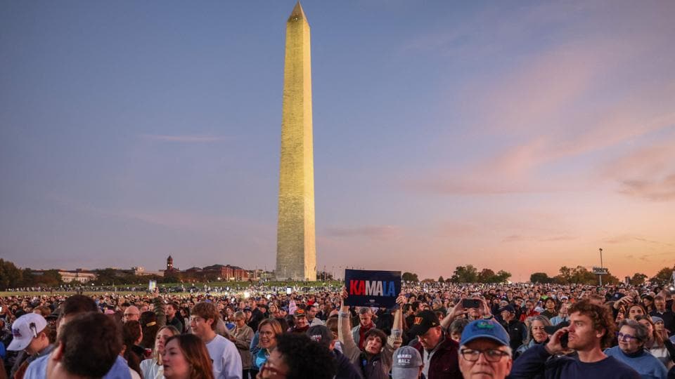 Supporters of US Vice President and Democratic presidential candidate Kamala Harris gather near the Washington Monument to hear her speak on The Ellipse, just south of the White House, in Washington (AFP)