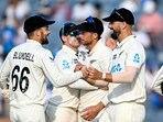 New Zealand's Tom Blundell (L), captain Tom Latham (2L), Mitchell Santner (2R) and Daryl Mitchell celebrate after their win against India at the end of the third day of their second Test New Zealand's Tom Blundell (L), captain Tom Latham (2L), Mitchell Santner (2R) and Daryl Mitchell celebrate after their win against India at the end of the third day of their second Test