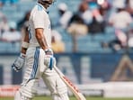 Pune: India's Virat Kohli walks back to pavilion after his dismissal on the third day of the second test match.