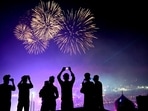 Ayodhya: People watch as fireworks light up the sky above �Ram ki Paidi� during �Deepotsav 2024� near the Saryu river on the eve of the Diwali festival, in Ayodhya, Ayodhya: People watch as fireworks light up the sky above �Ram ki Paidi� during �Deepotsav 2024� near the Saryu river on the eve of the Diwali festival, in Ayodhya,