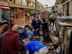 People clean their houses affected by floods in Utiel, Spain, Wednesday, Oct. 30, 2024. People clean their houses affected by floods in Utiel, Spain, Wednesday, Oct. 30, 2024.