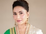 Kusha Kapila and Madhuri Dixit are decked up in ethnic looks. Kusha Kapila and Madhuri Dixit are decked up in ethnic looks.