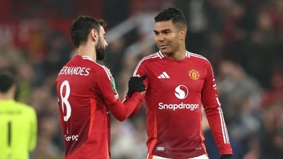 Manchester United's Portuguese midfielder #08 Bruno Fernandes (L) celebrates with Manchester United's Brazilian midfielder #18 Casemiro (AFP) Manchester United's Portuguese midfielder #08 Bruno Fernandes (L) celebrates with Manchester United's Brazilian midfielder #18 Casemiro (AFP)